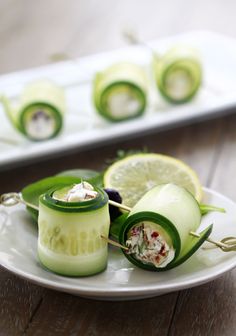 cucumber and other food items on a plate