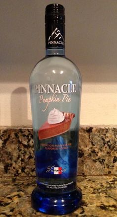 a bottle of pinnacle pie vodka sitting on top of a counter