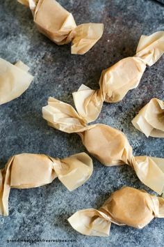 some dumplings are sitting on top of a table and ready to be cooked in the oven