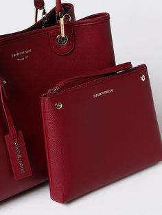 Find EMPORIO ARMANI Handbag on Editorialist. The Emporio Armani handbag features a top handle, a detachable and adjustable shoulder strap, and a logo tag. It also comes with a matching pouch. Navy Handbag, Emporio Armani Women, Blue Handbags, Logo Tag, Burgundy Color, Woman Colour, Shoulder Bag Women, Emporio Armani, Leather Tote