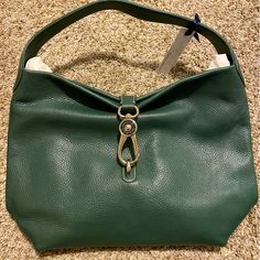 Nwt In Original Packaging Dimensions (In) L: 10.00 X W: 5.00 X H: 10.50 One Inside Zip Pocket. Two Inside Pockets. Cell Phone Pocket. Inside Key Hook. Handle Drop Length 8". Lined. Feet. Signature Doublesided Dooney & Bourke Logo Lock Closure. Classic Green Satchel With Branded Hardware, Elegant Green Bags With Brass Hardware, Elegant Green Satchel Hobo Bag, Classic Green Shoulder Bag With Metal Hardware, Green Tote Shoulder Bag With Palladium Hardware, Green Leather Hobo Bag With Gold-tone Hardware, Elegant Green Satchel With Metal Hardware, Elegant Green Shoulder Bag With Metal Hardware, Green Satchel With Branded Hardware For Daily Use