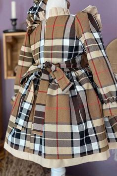 Plaid Cotton Dress For Winter, Elegant Plaid Dresses With Ruffles, Brown Ruffled Dresses For Winter, Long Sleeve Brown Plaid Dress For Fall, Long Sleeve Plaid Dress With Ruffles, Long Sleeve Cotton Plaid Dress For Fall, Long Sleeve Plaid Cotton Dress For Fall, Long Sleeve Plaid Dress With Ruffle Hem, Winter Plaid Ruffled Dresses