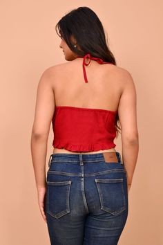 This is a backless crop top made of cotton fabric, it is soft and of good quality required low iron and easy to wash, it is featuring with high tie up front neck, sleeveless, fit is regular, length standard, you can carry this top with a nice pair of jeans and you are good to show in a party Materials Used: Cotton thread, Cotton fabric   Measurements: Brand Size           Bust (in)           Waist (in) S                                   34              28 M                           36                      30 L                           38                      32 XL                           40                      34 Disclaimer: Easy wash, Do not bleach, dry in shady area, do not use harsh substance. Note: The color of the product may vary due to the light used during the photography or Fitted Cotton Halter Top, Casual Fitted Cotton Halter Top, Fitted Cotton Halter Neck Top, Cotton Crop Top Tank Top, Backless Cotton Tank Top For Spring, Casual Cotton Halter Neck Crop Top, Spring Backless Cotton Tank Top, Trendy Cotton Halter Neck Tank Top, Red Camisole Crop Top For Spring