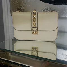 Like New, Only Worn Few Times Luxury Beige Clutch For Shopping, Evening Shoulder Bag In Beige With Branded Hardware, Cream Shoulder Bag With Branded Hardware For Formal Occasions, Formal Cream Shoulder Bag With Branded Hardware, Evening Bags With Branded Hardware In Cream, Cream Evening Bags With Branded Hardware, Elegant Beige Shoulder Bag With Branded Hardware, Beige Clutch With Gold-tone Hardware For Shopping, Valentino Crossbody Bag