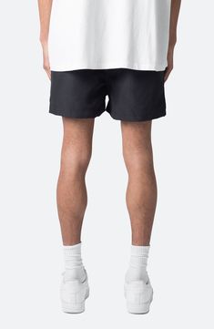 Sunny-day adventures are easy in these hardy ripstop shorts punctuated by a contrast orange drawcord handy pockets. 3" inseam; 14" leg opening; 14" front rise Elastic/drawcord-toggle waist Side-seam pockets 100% polyester Machine wash, line dry Imported Black Shorts With Functional Drawstring For Streetwear, Black Nylon Hiking Shorts, Streetwear Swim Trunks With Pockets, Black Swim Trunks With Pockets For Outdoor Activities, Black Athletic Shorts For Summer Outdoor Activities, Black Relaxed Fit Nylon Shorts, Black Nylon Shorts With Relaxed Fit, Black Outdoor Shorts With Elastic Waistband, Black Shorts With Elastic Waistband For Outdoor