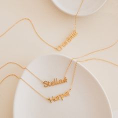 Give a meaningful gift to your child that they will wear every day with our Custom Kid’s Name Necklace. Both dainty and minimalist, this necklace can be personalized with any name and can even include cute symbols to make this jewelry piece more unique. Material: High-Quality Solid 925 Sterling Silver Finish: Sterling Silver ∙ 18K Gold ∙ Rose Gold Dimensions: Depending on your font choice, height sizes range from 3mm to 4mm lowercase SKU: HH-NH02F87 Minimalist Customizable Charm Necklaces As Gifts, Meaningful Custom Name Necklaces For Everyday, Custom Name Necklace For Everyday Use, Meaningful Nameplate Necklace For Everyday, Everyday Meaningful Nameplate Necklace, Customizable Everyday Nameplate Necklace, Minimalist Custom Name Charm Necklace As Gift, Minimalist Nameplate Necklace, Everyday Customizable Nameplate Necklace