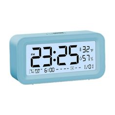 a blue alarm clock with the time displayed