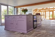 Bespoke purple kitchen island with freestanding wine cooler and plinth lights Purple Kitchen, Farmhouse Interior, Kitchen Extension, Bespoke Kitchens