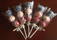 several lollipops wrapped in plastic wrappers