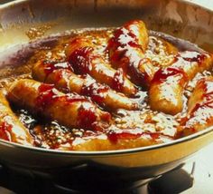 a pan filled with food sitting on top of a table