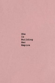 the words she is building her empire written in black on a pink background