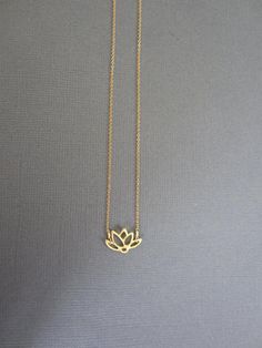 Vermeil Lotus Charm Necklace / Peridot Teardrop Briolettes / Gold filled chain / Gold filled Clasp/ Gold filled Wire *Lotus Pendant measures 13mm x 15mm *Available in Sterling Silver: *Available with Birthstone: https://www.etsy.com/listing/108151390/gold-lotus-necklace-lotus-petal-charm?ref=shop_home_active *In Buddhism the lotus flower is known to be associated with purity, spiritual awakening and faithfulness. The flower is considered pure as it is able to emerge from murky waters in the morn Dainty Flower Necklace For Birthday, Delicate Flower Chain Necklace As Gift, Delicate Flower Chain Necklace For Gift, Dainty Flower Pendant Necklace For Gift, Minimalist Necklace With Flower Charm For Gift, Minimalist Flower Pendant Necklace As Gift, Minimalist Flower Charm Necklaces As Gifts, Delicate Necklace With Flower Charm For Birthday, Dainty Flower Shaped Necklace For Birthday Gift