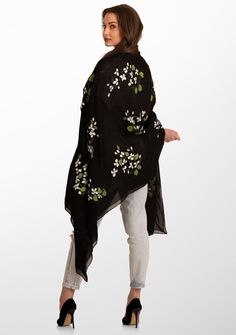 This black scarf crafted from a very light linen and modal blend features a stunning hand-painted Blooming Branches design. This georgeous scarf is further elevated with a tonal black georgette frill and filigree lace border making it the perfect statement piece whether as a casual accessory for a day out or to elevate an evening ensemble. It is a unique and must-have addition to any discerning woman's wardrobe. Black Bohemian Silk Scarf For Spring, Bohemian Black Silk Scarf For Spring, Black One-size Scarves For Spring, Black One Size Scarves For Spring, One Size Black Scarves For Spring, Black Summer Shawl Scarf, Black Shawl Scarf For Summer, Black Bohemian Silk Scarf, One Size, Black Bohemian Silk Scarf One Size