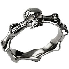 a skull and crossbone ring on a white background