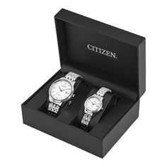 For a watch that is the perfect addition to every wardrobe, this classic his and hers Corso watch set from Citizen features stainless steel cases, paired with white three-hand dials for a unique style that is sure to stand out. Pairing function with form, the watches also use the patented Citizen Eco-Drive technology, so they are sustainably powered by light and will never require a new battery. The stainless steel bracelets secure with push-button fold over clasps and the watches are water-resi Light Watch, Watch Set, Jared The Galleria Of Jewelry, Citizen Eco, White Watch, Eco Drive, Silver Shop, Watch Box, White Dial