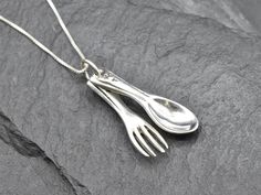 Spoon and Fork Necklace made of Solid 925 Sterling Silver ☞ made to last.Matching Ring & Earrings - please ask meDetails:• Food Lover Necklace• Dimensions: Pendant Height 2.6mm, Width 0.6mm• Free Complimentary Chain• Solid 925 Sterling SilverSKU TE-002 Fork Necklace, Lover Necklace, Silver Cutlery, Lovers Necklace, Plastic Ring, Matching Ring, Local Jewelry, Silver Spoons, Matching Rings