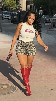 Oversized Tee And Boots Outfit, Heel Boots And Shorts Outfit, Camo And Red Outfit Women, Big Latto Concert Outfit, Black Women Club Outfit, Cheetah Skirt Outfit Black Women, Chrome Pants Outfit, Latto Outfit Ideas, Leopard Print Aesthetic Outfit