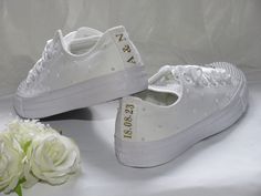 Romantic and elegant, our personalised white pearl wedding Converse are perfect for brides on the big day.  Whether you choose wedding sneakers for the whole event or opt for heels for the ceremony and a change into wedding Converse to dance the night away, you can be confident of comfort and style in our bridal Converse sneakers. Custom hand embellished with white pearls and finished with Grade A diamante sliders and white satin ribbon. Personalised back strips in glitter print on your choice of colour for that final finishing touch.  Ribbon colour can be changed to compliment your colour theme. Please just ask. Wedding Trainers, Bridal Converse, Wedding Socks, Wedding Sneakers, Converse Trainers