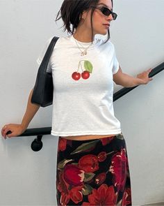 Our retro inspired cherry tee is perfect for casual summer outfits! All of our baby tees are digitally printed on 100% cotton and shrunken for a 90s style baby tee look. Pair with high waisted vintage levis for a casual look or with a vintage printed midi skirt for a casual evening outfit!  🍒 DETAILS 100% cotton Youth tees - these are small, shrunken t-shirts, not crop tops! Unisex Lightweight DTG - digitally printed  Ribbed collar Shoulder-to-shoulder taping Tubular seam construction Blank tee Trendy Crew Neck T-shirt With Cherry Print, Y2k Style Short Sleeve T-shirt With Fruit Print, Retro Cherry Print T-shirt For Summer, Fitted Cotton T-shirt With Cherry Print, Fitted Summer T-shirt With Strawberry Print, Fitted Strawberry Print T-shirt For Summer, Y2k Cherry Print Summer Tops, Fitted Short Sleeve T-shirt With Cherry Print, Fitted Cherry Print T-shirt For Summer