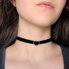 "A classic goth inspired choker featuring black velvet ribbon and your choice of silver, gold and bronze heart slider charm. The length shown in photos is 12\" and more options are available. Each size comes with an additional 2.5\" extender chain. For best fit, measure around the smallest part of your neck (close to center) and choose the next smallest size. If you would like a custom length, send me a message and I can make that for you :) Gold and silver tone options are gold or silver plated Adjustable Choker For Valentine's Day, Trendy Black Heart-shaped Choker, Trendy Black Heart Choker, Adjustable Heart-shaped Punk Choker, Black Heart-shaped Metal Choker, Adjustable Punk Heart Choker, Gothic Heart-shaped Metal Choker, Gothic Metal Heart Choker, Emo Choker Jewelry For Concerts