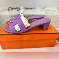 These Are Brand New Hermes Oasis Sandals In A Size 36.5 In The Color Lilac. Purchased At My Local Boutique. Comes With Original Box, Bags & Ribbon. They Have Never Been Worn As You Can See In The Pictures. These Are 100% Authentic Therefore No Returns. I Love Them But My Feet Are Too Narrow To Wear This Style. Hermes Oasis Sandals, Hermes Empire Sandals, Hermes Oasis, Yellow Hermes Sandals, Purple Hermes Sandals, Hermes Sandals Yellow, Hermes Mauve Pale, Hermes Oran Sandals, Box Bags