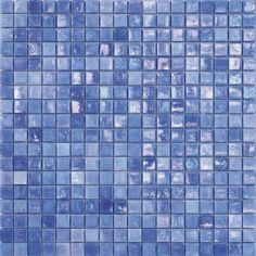 a blue tile wall with small squares on it