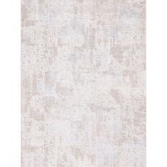 a white rug with an abstract design on it