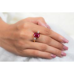 This is part of Chairish’s Fine Jewelry assortment.  Oval Cut Ruby Cocktail ring in 18K Gold which perfectly goes with your personality and also helps you to improve your energy and sensuality. Designed with big oval cut ruby in center and halo of clustered diamonds both side that makes it a perfect fit to wear it on your wedding or style it with any of your basic outfit to give it a glam.  PRODUCT DETAILS :-  > Material - 18K Solid Yellow Gold > Gemstone - Ruby > Gemstone Weight - 2.92 ct > Gemstone pcs - 1  > Gemstone shape - Oval  > Gemstone size - 12 x 9 mm > Diamond weight - 0.25 ct > Diamond Size - 1.5 mm > Diamond pcs - 14  > Gross Weight - 5.494 Grm > Shank width - 2 mm > Setting - Pinion Bezel setting Luxury Oval Ruby Birthstone Ring, Gia Certified Ruby Ring, Lab-created Ruby Ring With Brilliant Cut In Oval Shape, Luxury Oval Ring For Valentine's Day, Luxury Oval Rings For Valentine's Day, Oval Ruby Ring For Proposal, Gia Certified Fine Jewelry Ruby Ring, Oval Red Diamond Proposal Ring, Ruby Ring With Center Stone For Proposal