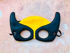 Embroidered mask. This listing is for one mask. Color: Yellow/Black Blue ,Red/Black Made of marine vinyl and felt This mask is embroidered. Its made of felt and marine vinyl and has a soft felt back for the comfort of your child. There is a 15 inch elastic band that will fit most children and adults. The elastic allows your child to wear and remove the mask easy. Perfect for Birthday party. Like as on Facebook:https://www.facebook.com/HoneyRoseCreation/ Superhero Masks And Prosthetics For Halloween Costume Party, Themed Costume Eye Mask, Playful Masquerade Masks For Halloween, Black Fun Masks And Prosthetics For Halloween, Handmade Halloween Masks, Novelty Masks For Costume Party And Cosplay Events, Handmade Halloween Costume Mask, Fun Eye Mask For Costume Party, Fun Black Masks For Masquerade