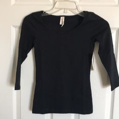 Top Runs Small, Order One Size Up. Treat Yourself To A Black Tee That Will Be The Foundation Of Your Wardrobe. The Wide Scoop Neck And 3/4 Sleeves Of This Stretchy Knit Keep Things Comfortable And Feminine. Juniors Size Small (Size 1-3). Can Also Be A Girl Shirt. Armpit To Armpit- 12 1/2”. Length Is 21”. 95% Cotton And 5% Spandex. Machine Wash Cold, Tumble Dry Low. Sold By Nordstrom. Franchi In Bp Dept. New With Tags. Smoke Free Home. Black Soft-washed Long Sleeve Tops, Rayon Blouse, Floral Blazer, Scoop Neck Tank Top, Purple Top, Knit Tunic, Running Tops, Lace Tank Top, Lace Tank