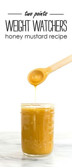 a wooden spoon is pouring honey into a jar with the words, how to make weight watchers honey mustard recipe