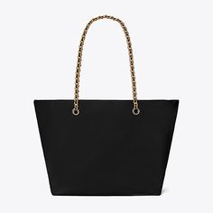 Instantly recognizable. The Ella Chain Tote is softly deconstructed in featherweight recycled nylon with a braided chain strap. Ideal for every day and getaways, it has a roomy interior for all the essentials, including a laptop. Tory Burch Ella, Miller Sandal, Designer Totes, Womens Designer Handbags, Leather Wraps, Tote Bag Design, Chain Strap, Leather Trims, Patch Logo