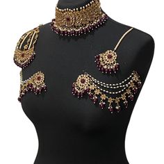 Handcrafted maroon antique golden kundan Indian wedding / bridal jewellery set. Set includes- Earrings with multilayer pearl sahara  Choker necklace Jhumar Tikka  Our choker is adjustable with a dori at the back giving you a comfortable fit. It comes with elegant kundan earrings with pearl detail, tikka and jhumar with hooks.  The subtle glimmer of the kundan with elegant pearl detail makes this jewelry set a truly head turning piece, a must have for every jewellery box.  Our ethnic jewellery se Jhumar Tikka, Pakistan Jewelry, Pakistani Jewellery, Choker Jewellery, Jewelry Kundan, Kundan Jewellery Set, Indian Jewelry Sets, Pakistani Jewelry, Kundan Earrings