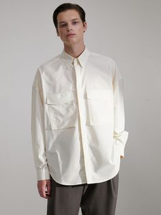 Editor's NotesThe oversized shirt from EVENER features a minimal design with hidden button detail.- Button closure- Hidden button- Regular collar- Oversize fit silhouette- Flap pocket detailsMeasurements(in.)2/3- Total length: 31.10 / 31.88 in.- Sleeve length from the center back: 35.43 / 36.22 in.- Chest: 57.08 / 59.05 in.- Hem: 55.11 / 57.08 in.Model infoMan - Height: 6'13 Fitting size 3Composition & Care- 49% Rayon, 30% Polyester, 21% Nylon- Please check the care labelDesigner- by EV Classic Cream Shirt With Pockets, Cream Button-up Shirt With Pockets, Modern Oversized Shirt With Button Closure, Oversized Workwear Shirt With Concealed Placket, White Shirt With Buttoned Pockets For Work, Oversized Collared Shirt With Welt Pockets, White Buttoned Pockets Shirt For Work, Oversized Button-up Shirt With Concealed Placket, White Oversized Shirt With Lapel Collar