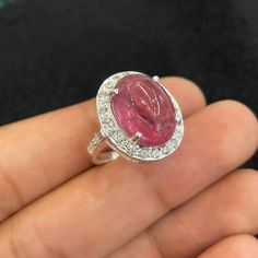 Welcome to  ROYALJEWELLRY  , "WHERE QUALITY MATTERS✌️" Delightful AAAA+ Natural Red Tourmaline Ring//Oval Cabochon Ring// CZ Around//925 Solid Sterling Silver//Engagement Ring//Men-Women Ring// Materials         : 925 sterling silver Center Stone :- Natural Red Tourmaline  Shape : Oval Quality : AAAA+  Accent stone :- CZ Round Shape  Symbolism:- Tourmalines enjoy worldwide popularity. Some people believe tourmalines have healing and stress relieving properties. Tourmalines have also been credite Shape Symbolism, Red Tourmaline, Silver Engagement Ring, Boost Creativity, Ring Men, Sterling Silver Engagement Rings, Cabochon Ring, Tourmaline Ring, Ring Oval