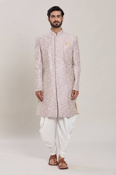 Pink full sleeves malai silk kurta with all over Gul embroidery using zari and sequin highlights. Paired with a white peshawari pant. - Aza Fashions Navratri Kurta With Naqshi In Traditional Drape, Ceremonial Cotton Silk Bandhgala For Festivals, Traditional Raw Silk Wear With Naqshi Detailing, Traditional Naqshi Raw Silk Traditional Wear, Navratri Raw Silk Sherwani With Cutdana Detail, Wedding Cotton Silk Sherwani With Naqshi, Wedding Sherwani With Naqshi For Navratri, Traditional Fitted Cotton Silk Sherwani, Traditional Cotton Silk Sherwani With Naqshi