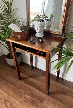 "Antique flat top desk with Iron fittings and a large cubby space-circa 1900.  This fantastic piece of history can be used in a multitude of ways:  - A great mudroom / entryway table as shown, nice and sturdy with no worries about scuffs and scratches. *Make your own charging station by adding a power strip in the cubby for cords!  - Obviously great as a desk, it works well for your printer or microwave with storage for paper or cookbooks below.  - Use as a TV stand with the cable box below or set a lamp and mirror on top as a vanity. *A small hole could easily be drilled into the back for wires.  MEASUREMENTS (Approx): 30.5\" Tall 26\" Wide 18\" Deep (from front to back) CONDITION: Very Good Antique Used Condition. Heavily built, amazingly sturdy. There is finish wear appropriate to its' Antique Desk Entryway, Entryway Desk, Mail Table, Entryway Table Antique, Vintage Entryway, Vintage Small Desk, Antique Entry Table, Entry Way Table, Entryway Table