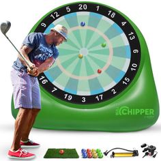 a man hitting a golf ball in front of a green clock with numbers on it