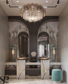 an elegant bathroom with two sinks, mirrors and chandelier in the middle of the room