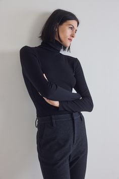 Made from premium ribbed fabric, this turtleneck sweater offers a luxurious feel against the skin. The ribbed texture adds depth to its design while providing a flattering and form-fitting silhouette that accentuates your curves in all the right places. Turtleneck Stretchy jersey Fitted Lightweight Vision Board Photos, Travel Capsule, Semi Annual Sale, All The Right Places, Character References, Ribbed Turtleneck, Ribbed Texture, Winter Travel, Rib Cage