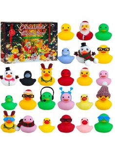 christmas rubber ducky toys are in front of a box with an assortment of rubber ducks