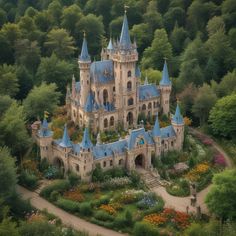 an aerial view of a castle surrounded by trees