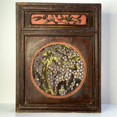 an intricately decorated wooden box with decorative designs