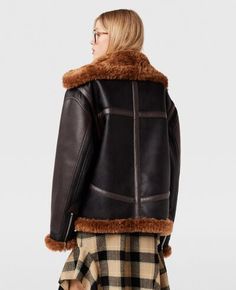 Fall Leather Biker Jacket With Faux Fur Lining, Trendy Leather Outerwear With Padded Collar, Moto Style Winter Outerwear With Padded Collar, Winter Moto Style Outerwear With Padded Collar, Winter Moto Outerwear With Padded Collar, Edgy Brown Winter Outerwear, Oversized Leather Biker Outerwear, Oversized Edgy Leather Jacket For Winter, Oversized Biker Outerwear For Fall