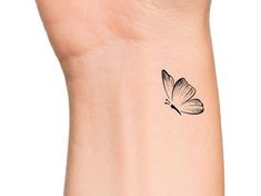 White Butterfly Tattoo, Butterfly Temporary Tattoo, 40 Aesthetic, Cool Wrist Tattoos, Butterfly Tattoos For Women, Small Pretty Tattoos, Tasteful Tattoos