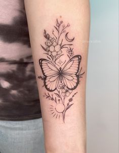 Butterfly tattoo sun and moon #flowertattoo #butterflytattoo #sunandmoontattoo #floraltattoo #finelinetattoo #tattooforwomen Swirl Tattoo Designs, Jesus Tattoo Ideas, Tattoo Sun And Moon, 59 Tattoo, Tattoo For Women Arm, Ra Tattoo, Feminine Arm Tattoos, Trinity Knot Tattoo, Goat Tattoo