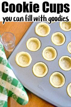 mini cookie cups are sitting on a baking tray