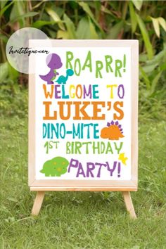 a sign that says roar welcome to luke's dino - mite 1st birthday party