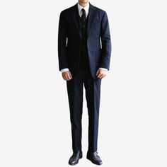 Introducing the Classic Fit Men's Basic Wool Blend Suit Pants in Navy Color. These dress pleat trousers are a sophisticated addition to any gentleman's wardrobe. Crafted with meticulous attention to detail, these pants offer a perfect blend of style and comfort. The classic fit of these suit pants provides a timeless silhouette that exudes elegance. The navy color adds a touch of refinement, making them suitable for formal occasions and professional settings. Embrace the winter chill with confidence. These pants not only provides warmth but also exudes an air of sophistication. Designed with pleats, these trousers offer a sophisticated and polished look. The pleats provide subtle volume and drape, enhancing the overall aesthetic of the pants. They also allow for ease of movement and comfor Uniform Tailored Suits For Workwear, Tailored Business Suits With Uniform Style, Tailored Business Suits In Uniform Style, Business Tailored Suits In Uniform Style, Formal Solid Color Three-piece Suit, Gentleman's Wardrobe, Pieces Men, Pleated Trousers, Single Breasted Jacket