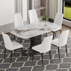 a marble dining table surrounded by white chairs